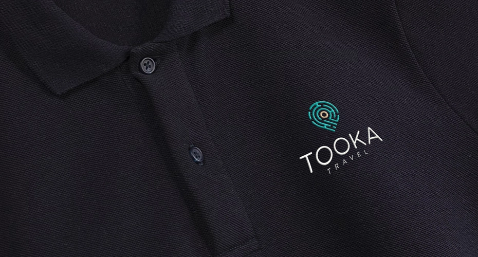 Tooka Travel Logo On a Polo Shirt